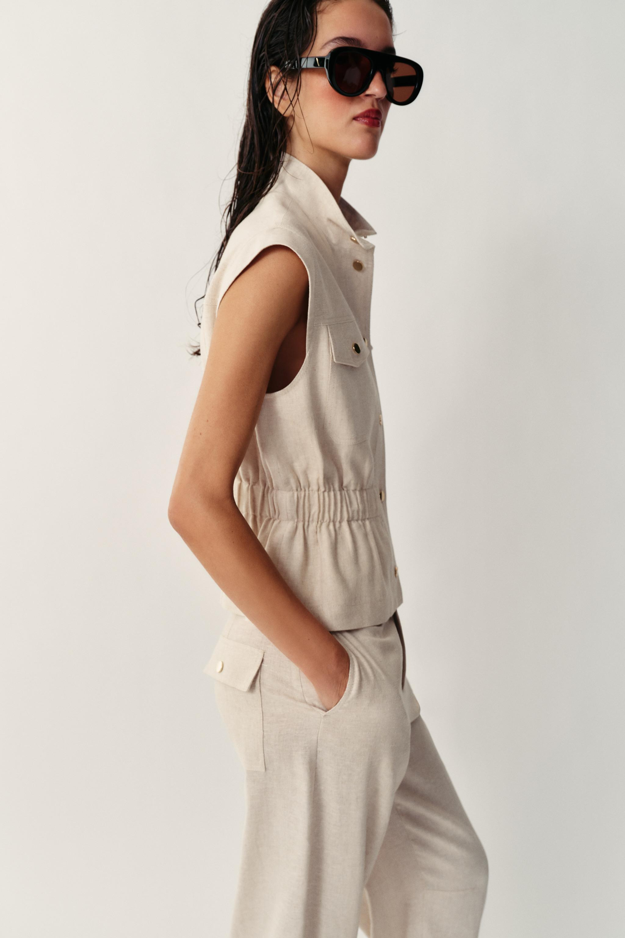 DescriptionContentsMeasurementsVest made with 52% linen yarn. High collar and sleeveless design. ... | Zara US