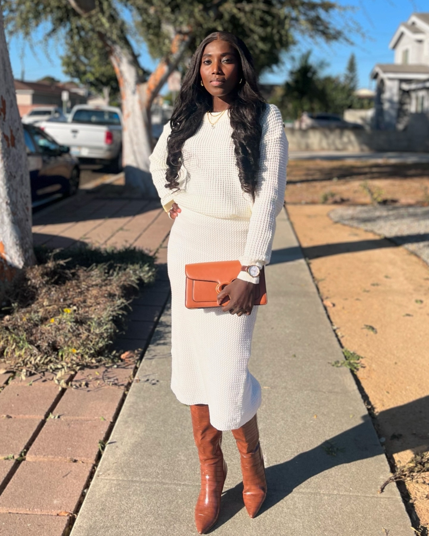 Cozy, chic, and holiday-ready! 🍂✨ This white knitted msweater and skirt set paired with classic brown boots and a matching bag make the perfect cozy statement for Thanksgiving gatherings and all the festive moments this season. Effortless style for a warm and welcoming holiday! 🤍🍁🎄 

Outfit:
Knitted Sweater: @walmart 
Knitted Skirt: @ninewest (shopped in Kohls) can’t find the skirt on kohls! It’s gone cause I got it on clearance but would look for similar skirt!
Boots: @justfabonline 
Bag: @coach 
Gold accessories: @shein_us 

#thanksgivingstyleinspo #holidayoutfits #winterwardrobe #HolidayOutfit #mixandmatchstyle  #fallfashion #falllooks #outfitinspirations #fashionstyle #styleinspo #pintrestinspired #howtostyle #outfitinspirations #modest #minimalfashionblogger #outfits #ootd #londonfashion #minimalstyledaily #lafashioninfluencer #streetwear #fall #styleblogger #fashionblogger #falloutfitinspo