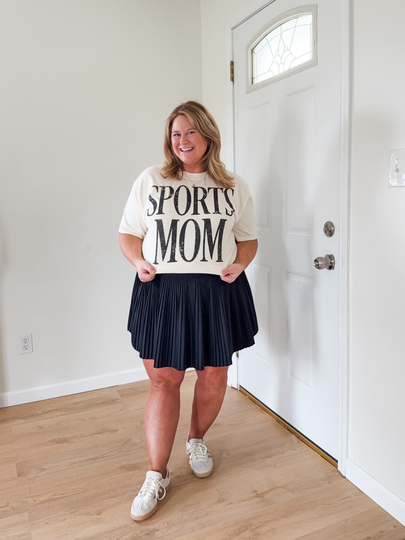 Wearing an XL in my graphic tee from Mountain Moverz (I usually do a large but sized up for the bump).  You can use code STEPHSHARES20 to save $$!  

My pleated skort is older so linking similar  

#LTKActive #LTKBump #LTKMidsize