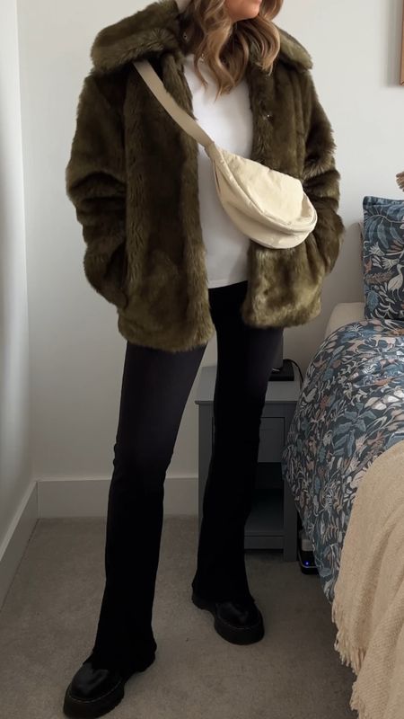 The green faux fur jacket that I never knew I needed in my life until the Black Friday sales bought it my way. I’m obsessed. I’ve styled it with a neutral ganni beanie, simple Uniqlo cross body bag and split leggings with dr marten Jadon boots to finish the outfit. 

#LTKstyletip #LTKSeasonal #LTKeurope