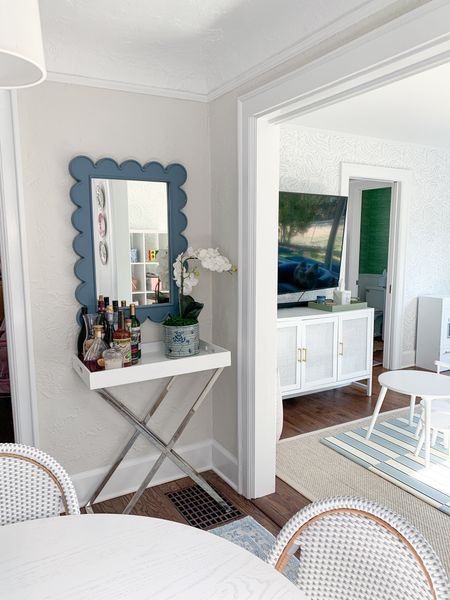 Blue scallop mirror, bar cart, blue and white home decor 

#LTKHome #LTKFindsUnder100