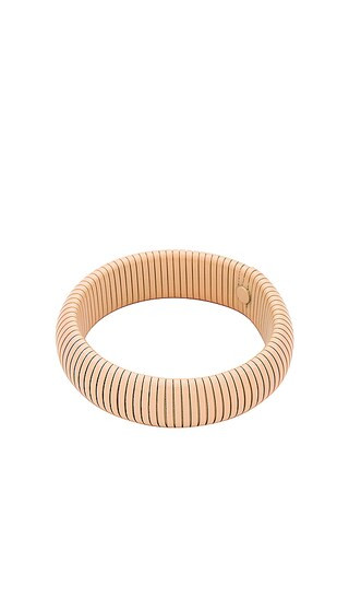 Bangle Bracelet in Cream | Revolve Clothing (Global)