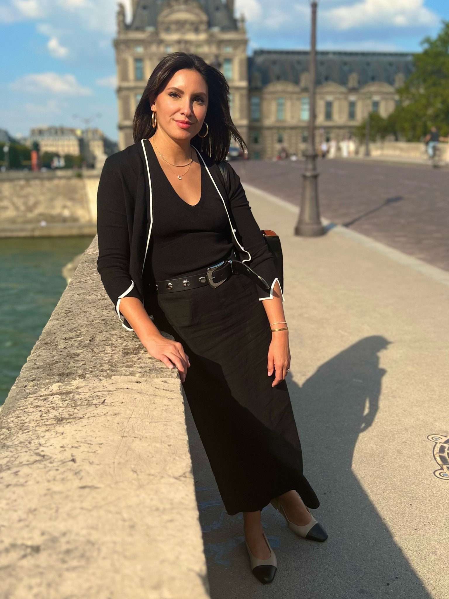 Sometimes the accessories really make the outfit! Love how this silver stud belt really made this all black outfit pop. But don’t get me wrong, what you need most in your closet is this black midi skirt and it’s under $20 right now.

#LTKFindsUnder50 #LTKTravel #LTKStyleTip