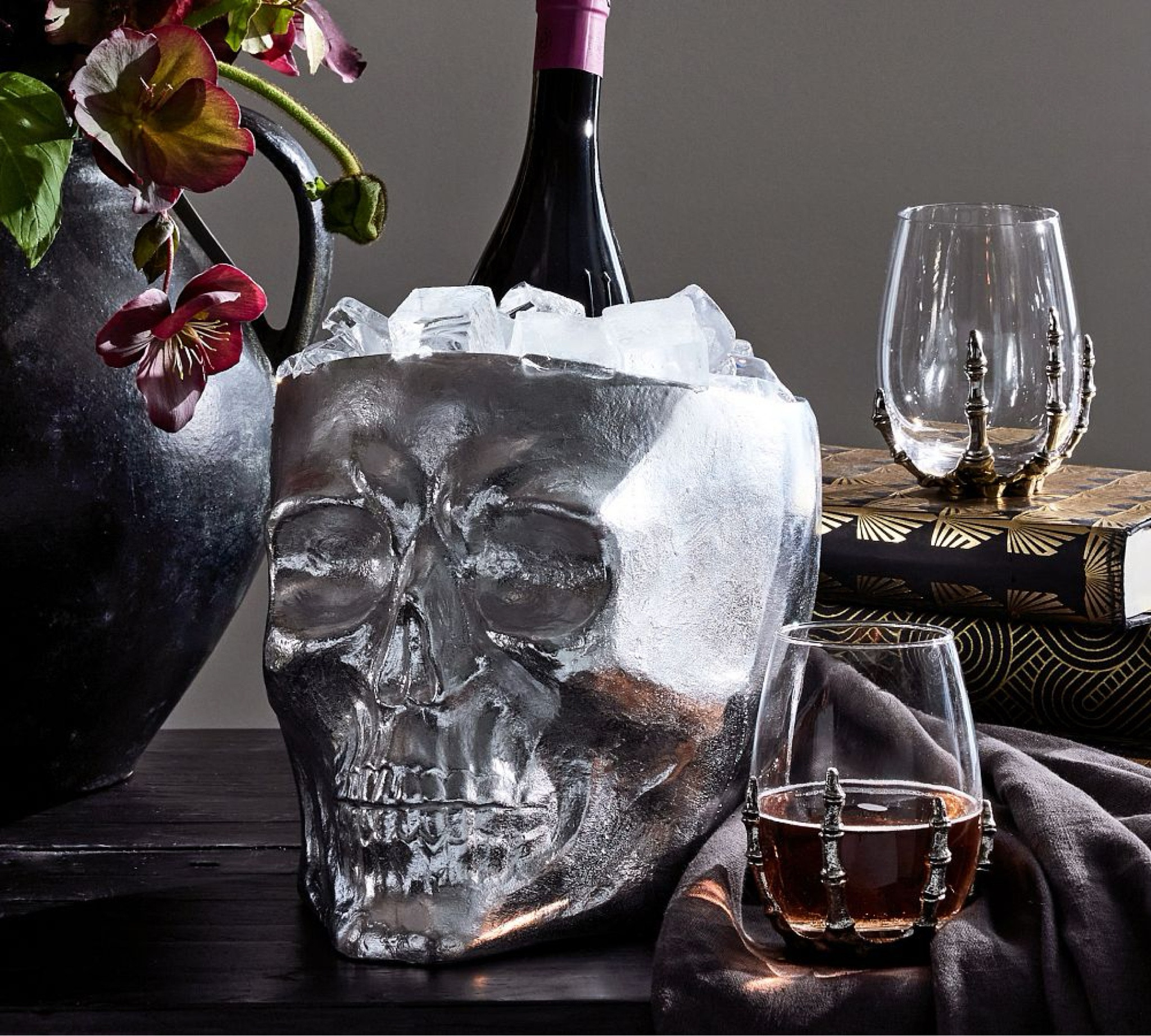 This frightfully fun piece is ready to turn heads. Crafted of hand-cast aluminum, this wine chiller features classic style with a high-polish finish. Fill it with ice to keep bottles cold and the mood oh-so-scary.

#winechiller
#skull
#halloweendecor
#partydecor
#skullwinechiller
#hallowendecoration

#LTKHalloween #LTKHome #LTKParties