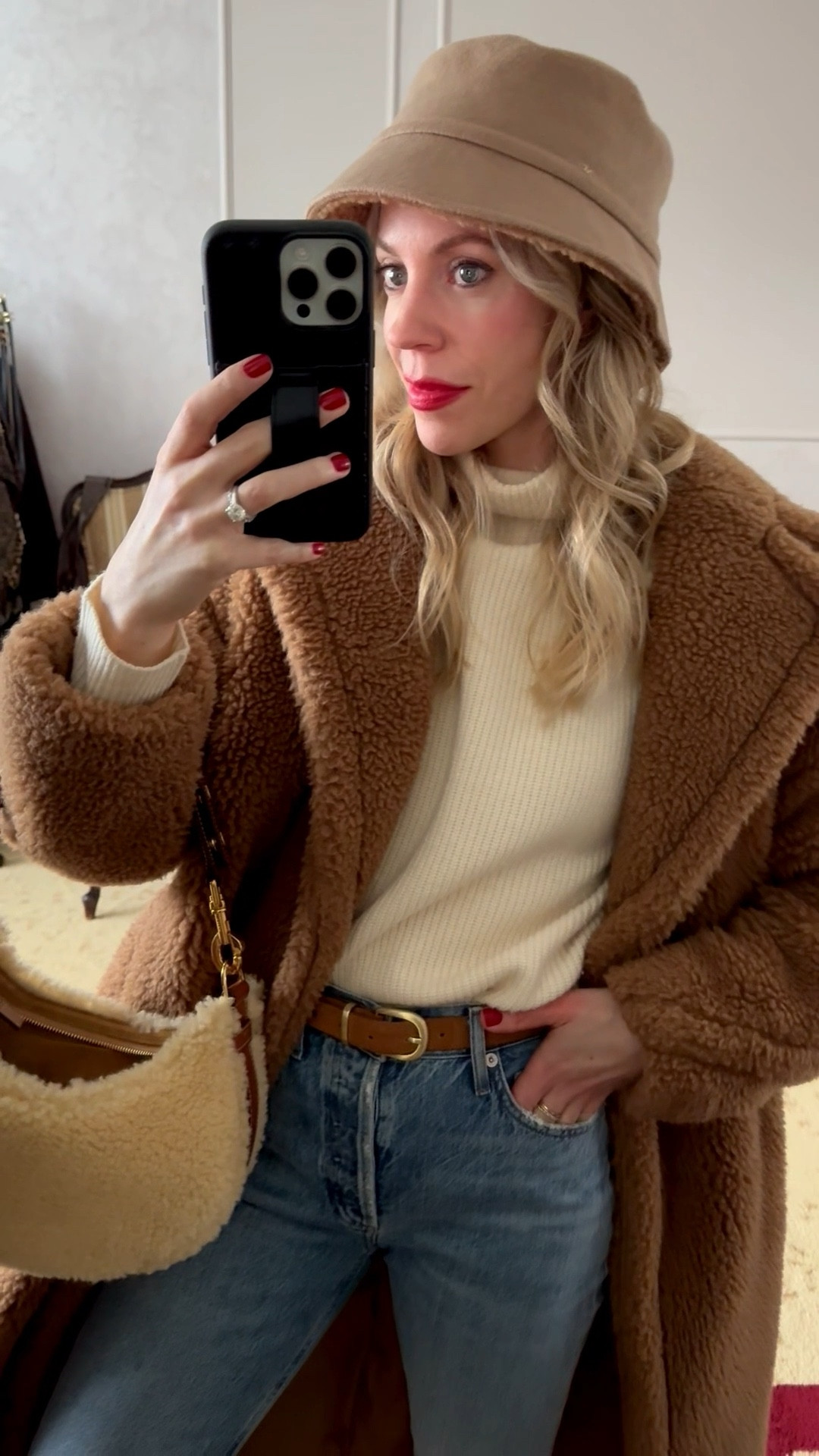 Teddy coat, shearling fur bucket hat, cozy winter ootd, slim straight leg jeans with Ugg mini boots 

#LTKSeasonal #LTKOver40 #LTKootd