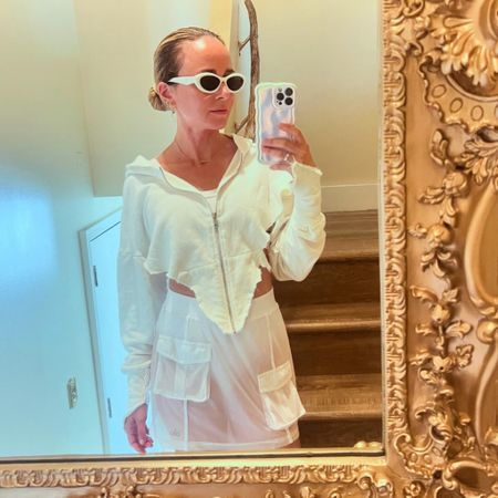 Loving funky sunglasses lately. Amp up any outfit with a cool pair of cat eye shades 🤍

Wearing size xs in all clothing pieces. 

#prada 
#cateye 
#whiteoutfits 
#athletic 

#LTKFitness #LTKSeasonal #LTKTravel