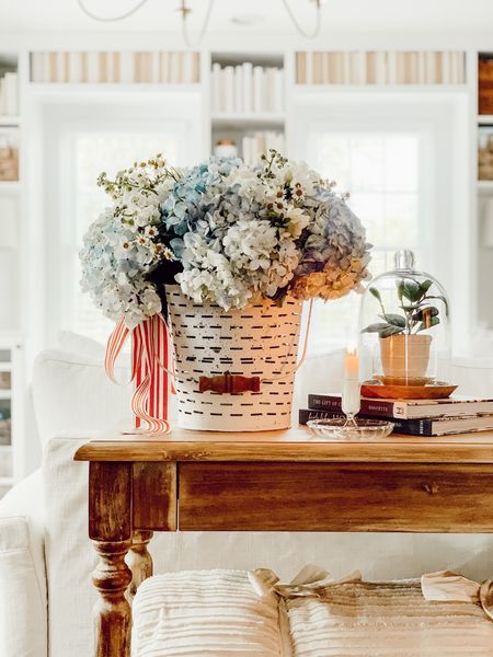 Patriotic decor with fresh flowers and red striped ribbon. 

#LTKhome #LTKstyletip #LTKSeasonal