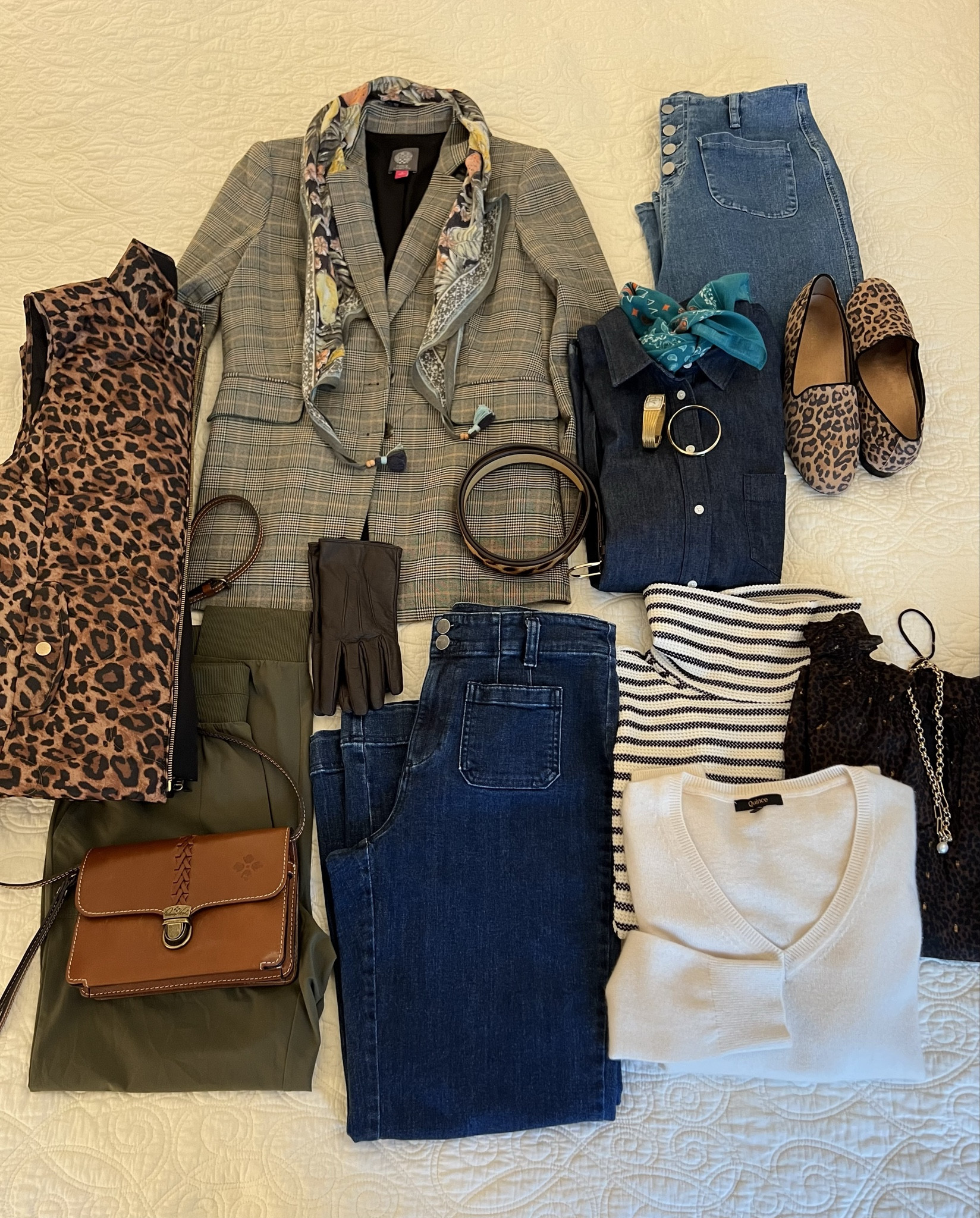 If you like having cute, easy to mix and match outfits for your fall 🍁getaway or for your upcoming Thanksgiving 🦃weekend, I’ve got you covered with this collection of pieces!
I started with a plaid @amazon blazer, added a dark denim shirt, medium wash jeans, dark wash wide leg jeans, as well as oh-so comfy olive joggers. Then, for MAJOR VERSATILITY, I added a darling oversized striped turtleneck, a dressier brown and black soft leopard 🐆 chiffon-like top (perfect for date night or a fun dinner reservation), and my TERRIFIC @quince off white v-neck cashmere sweater that you NEED in your closet!  I added a reversible leopard-to-black puffer vest (perfect for cool mornings and evenings).To tie everything together and add the necessary zhoosh, I packed comfy leopard 🐆 flats, a pretty J Jill drapey scarf, a small bright cotton @sundance scarf (to wear under the denim shirt or the v-neck sweater, and a leopard 🐆 belt. I added my favorite brown cross-body bag, brown leather gloves (to protect my hands from the cool dry weather), and a classic gold link necklace with a central pearl to wear under most outfits. THESE PIECES ARE SO MUCH FUN! Very versatile and interchangeable! Check them out!

#LTKVideo #LTKOver40 #LTKSeasonal