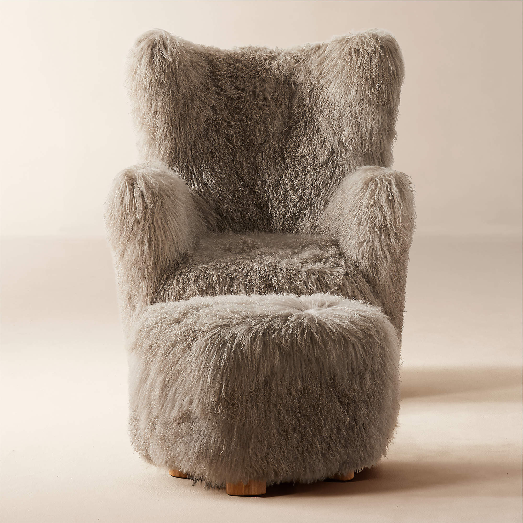 Bozzi Taupe Mongolian Sheepskin Chair and Ottoman Set + Reviews | CB2 | CB2