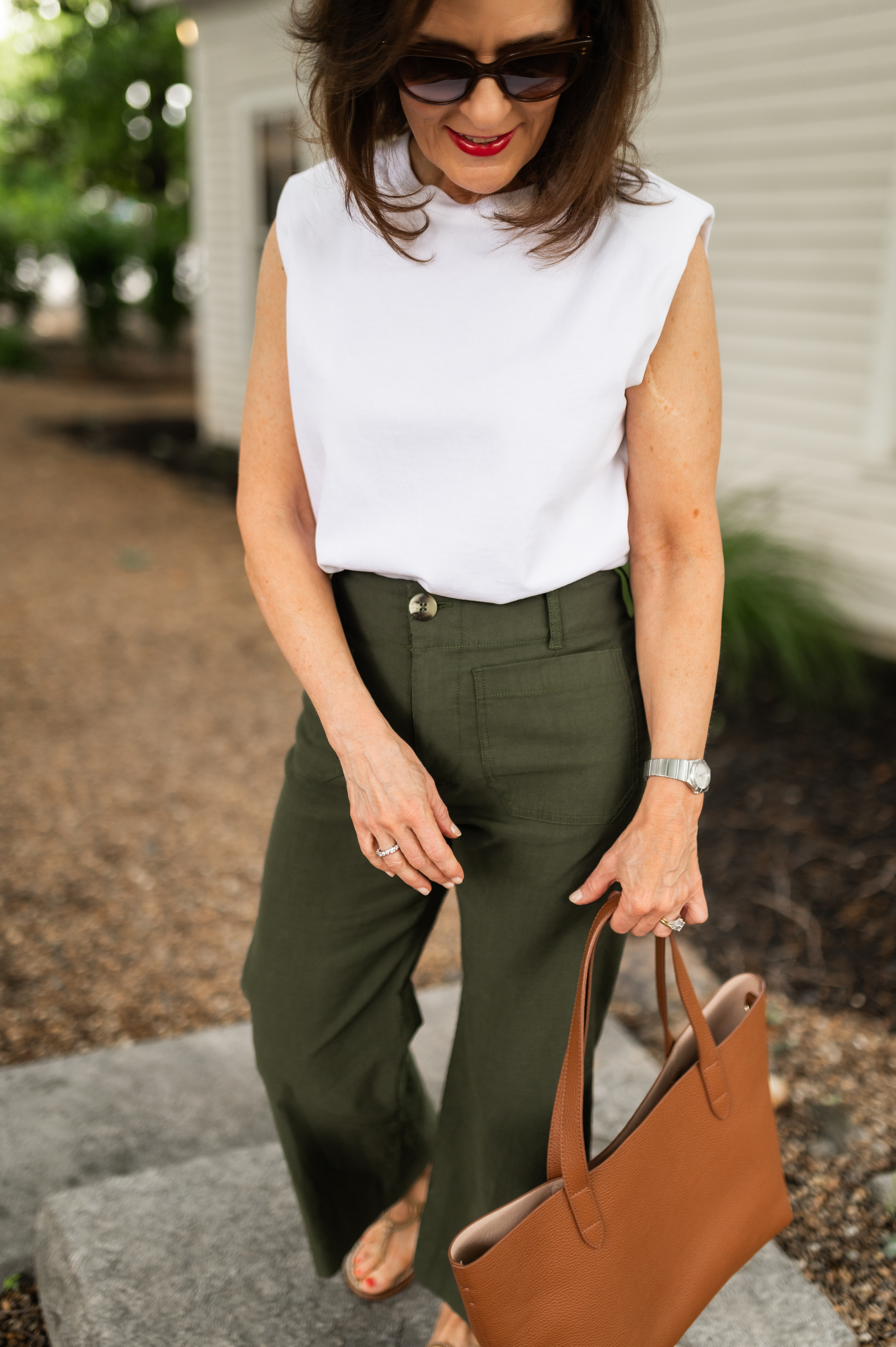A white muscle t-shirt is a great spring and summer closet staple.  Slenderizing wide leg pants are so comfortable.  This is one of my go to outfits for an elevated casual look. 

 

#LTKOver40 #LTKPetite #LTKStyleTip
