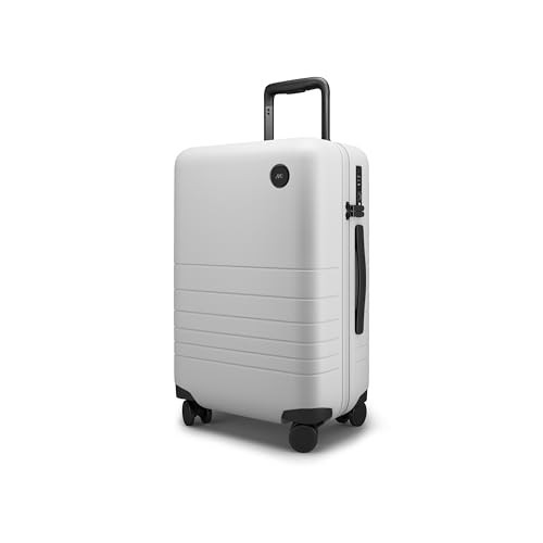 Monos Carry-On Plus Luggage, 23" Hardside Polycarbonate Spinner Suitcase, Airline Approved, Lightweight, TSA Lock, 23x15x9.5, Travel Bag for Women Men | Stellar White | Amazon (US)
