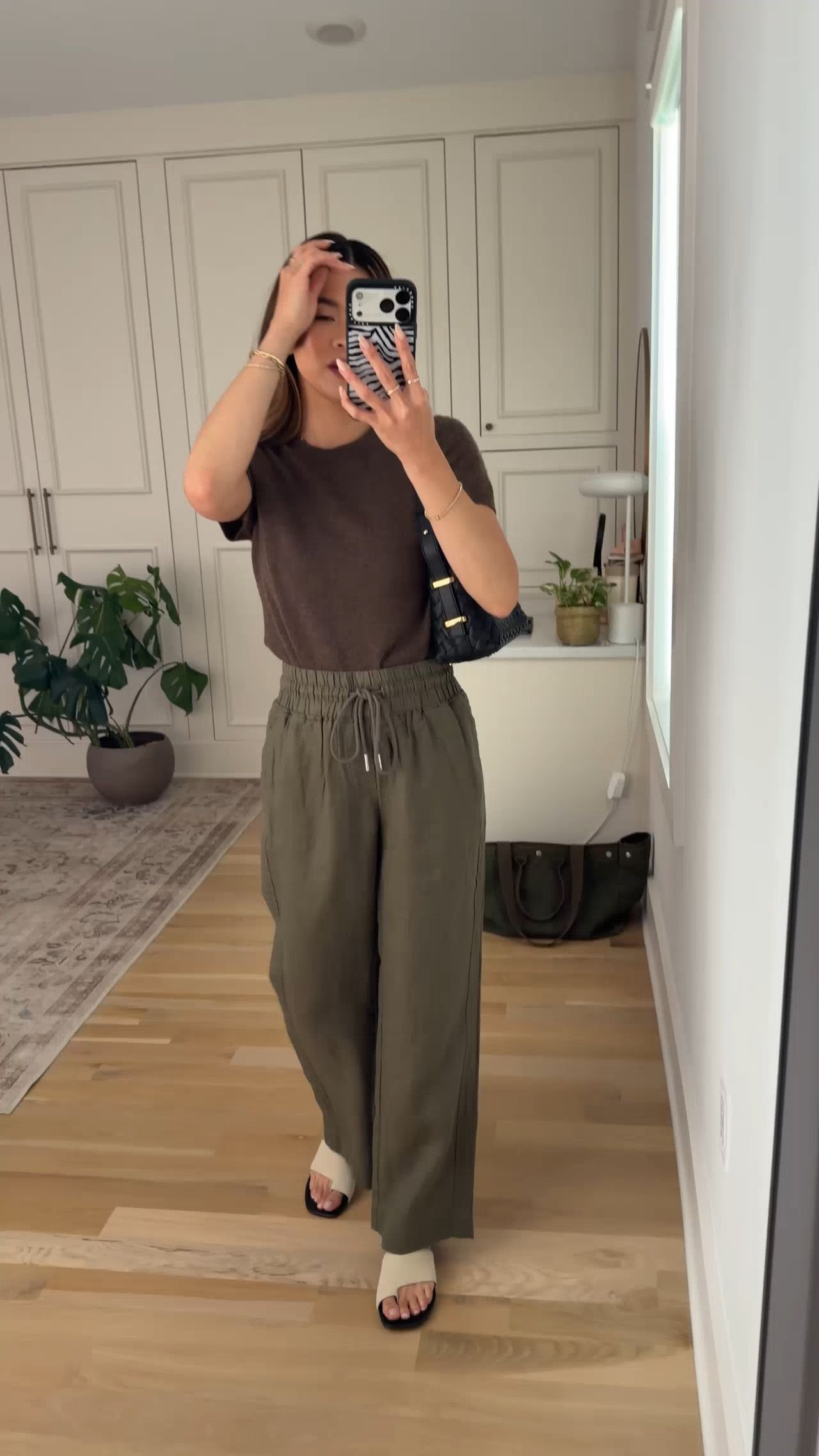 Sizing info:
•Top size XS
•Pants size XS in a 28inch inseam in bay berry olive 

petite fashion, get dressed with me, outfit inspiration, ootd, nashville outfit, Nashville influencer, petite style, vacation style, casual outfits, mom style, petite pants, spring outfits, spring outfit info, spring pants, spring outfit idea, spring top, spring bag, spring sweater, spring shoes, sweater top, linen pants, summer pants, spring trouser, spring linen pants, quince linen pants  
@Quince 
 

#LTKSeasonal #LTKootd #LTKPetite