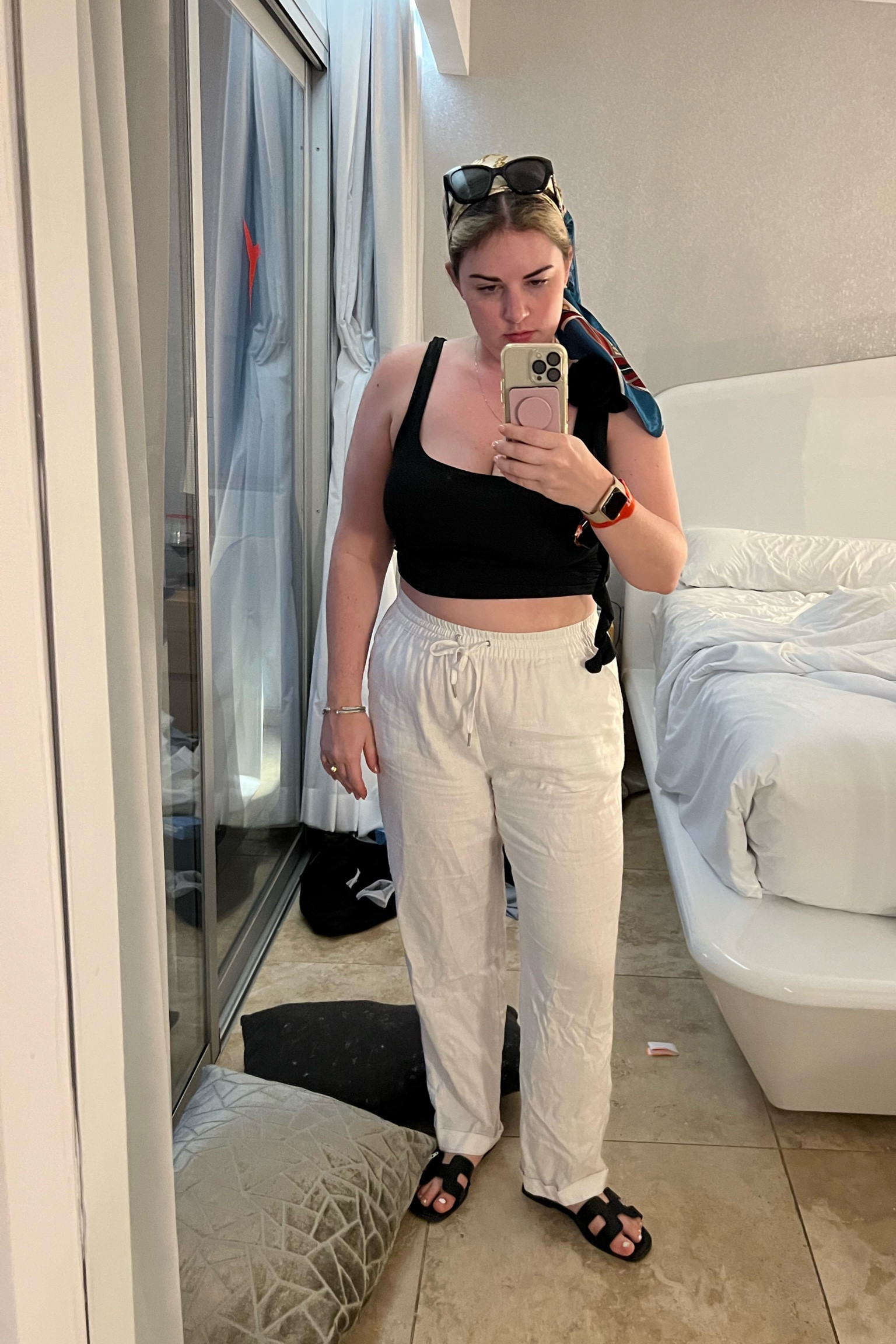 This comfy outfit was perfect to go venture out to watch the sunrise. The silk scarf is a must in Europe. You sweat a lot so the silk scarf helps you look a little more chic. Linen pants are also an absolute must for Europe. I wore these a ton. This top is part of a more clubbing type set but the top is giving Sofia Richie with the rosette. These oran amazon dupes were so comfortable as well! 

#LTKtravel #LTKSeasonal #LTKFind