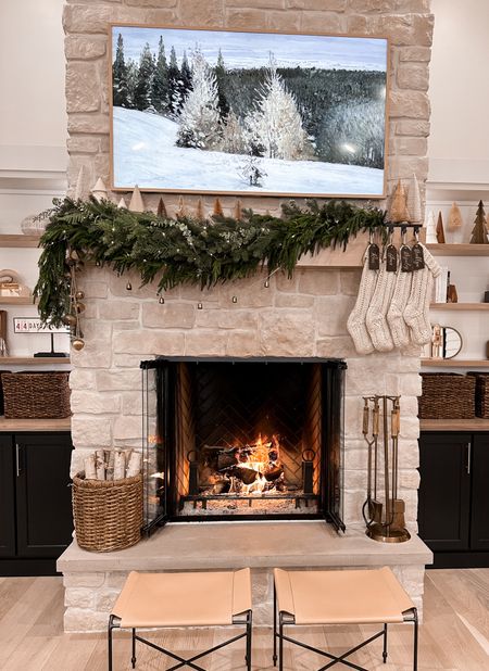 Fireplace decor | holiday decor | tv artwork | garland 

#LTKHoliday #LTKhome #LTKSeasonal