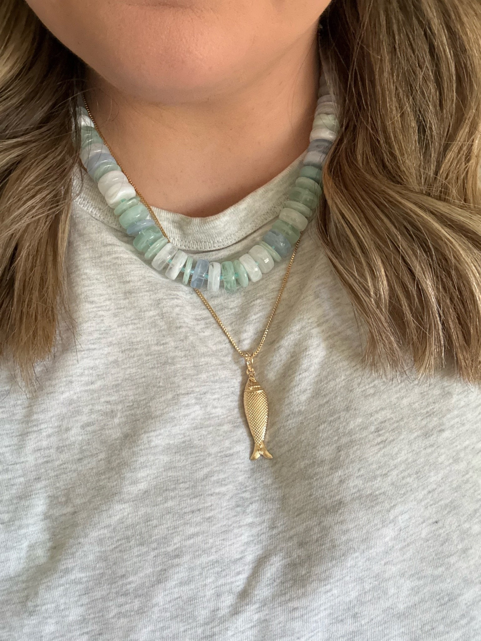 Cute statement necklace from Walmart. Obsessed with color of these beads and the fish charm. These come as a set, and instantly elevates a simple outfit without breaking the bank.

#LTKootd #LTKSeasonal #LTKdayinmylife