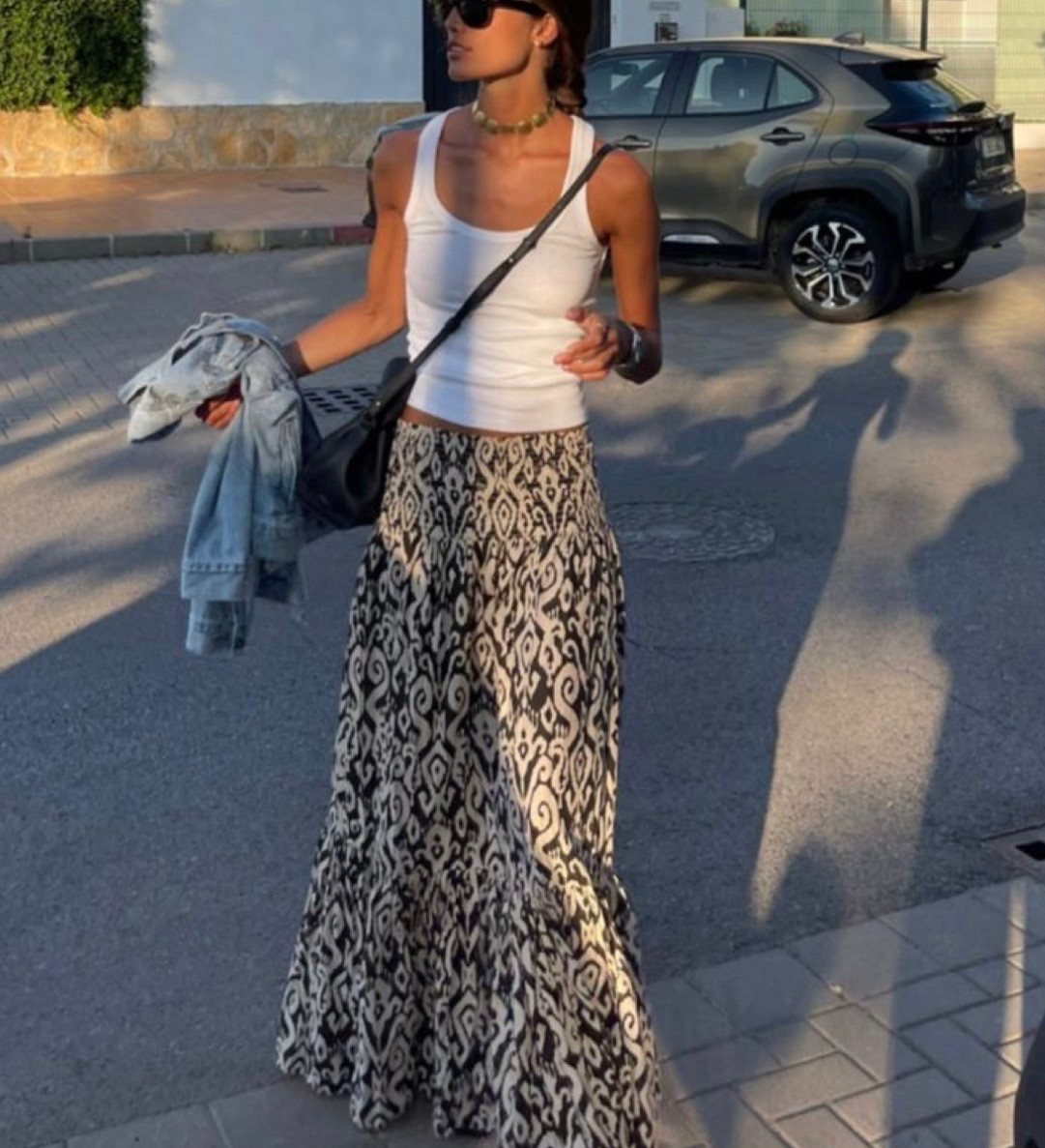 Euro summer style loading…..
Shop now for this long skirt and simple white tank top that will having you turning heads this summer 🖤🤍

#LTKootd #LTKSpringSale #LTKstorytime