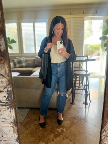 TGIF! Wearing some basics for an easy Friday teaching. My high rise jeans are on sale. I’m wearing 4 short and am 5’2” for reference. Teacher workwear outfit

#LTKover40 #LTKworkwear #LTKsalealert