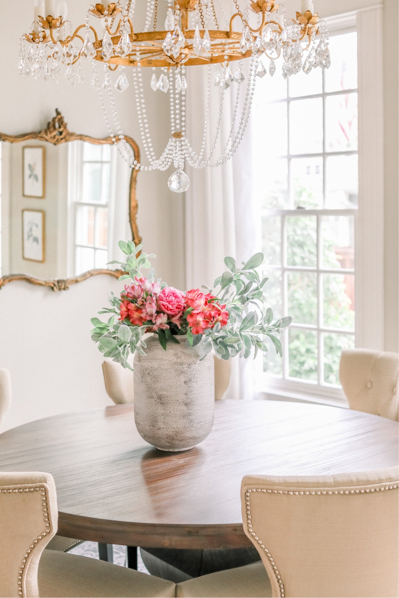 Formal dining room 60 inch round round dining table gold antique gold crystal chandelier empire chandelier 

#LTKhome #LTKstyletip