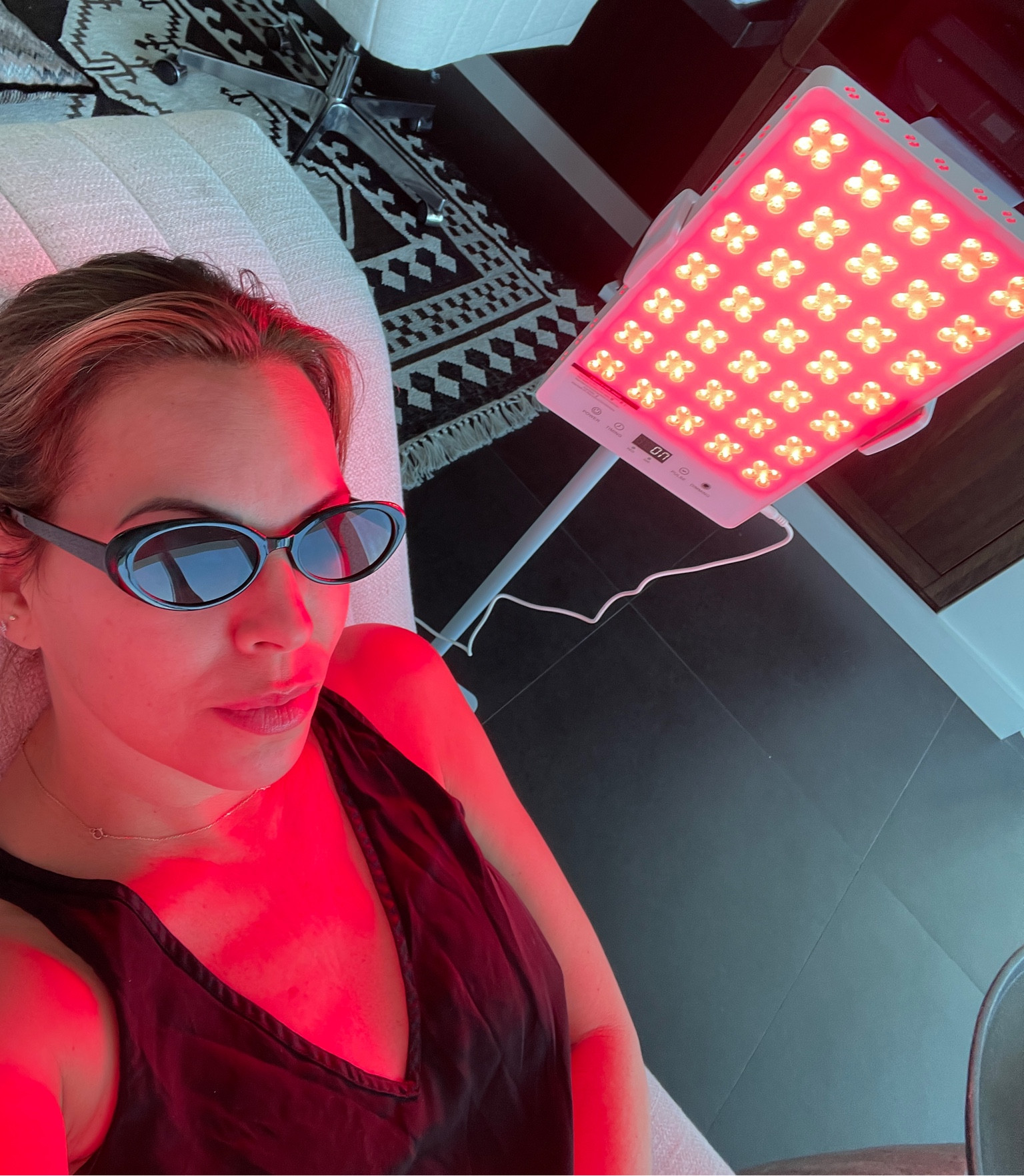 This red light on a stand makes it so easy and portable to do your red light therapy! The stand is key so you can lay on your stomach or back and shine it directly down on your skin. 

#redlighttherapy
#wellness

#LTKtravel #LTKhome #LTKbeauty