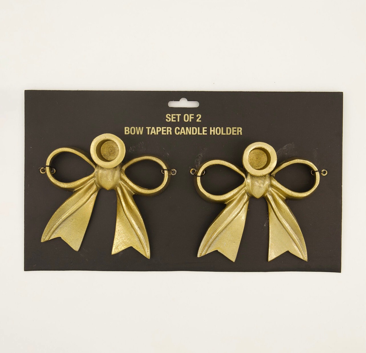Bow candle holders 

#LTKhome #LTKeurope #LTKsummer