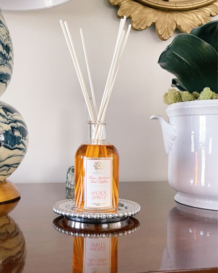 Cheers to the new @anticafarmacista Aperol Spritz scent just launched 2 days ago! I love the fresh citrusy scent balanced with a hint of muskiness. Perfect for thinking about spring ahead! Not only does it smell amazing, but the bottle is so elegant and is the perfect decor piece in my home! #AnticaFarmacistaPartner

#LTKhome #LTKunder100 #LTKunder50