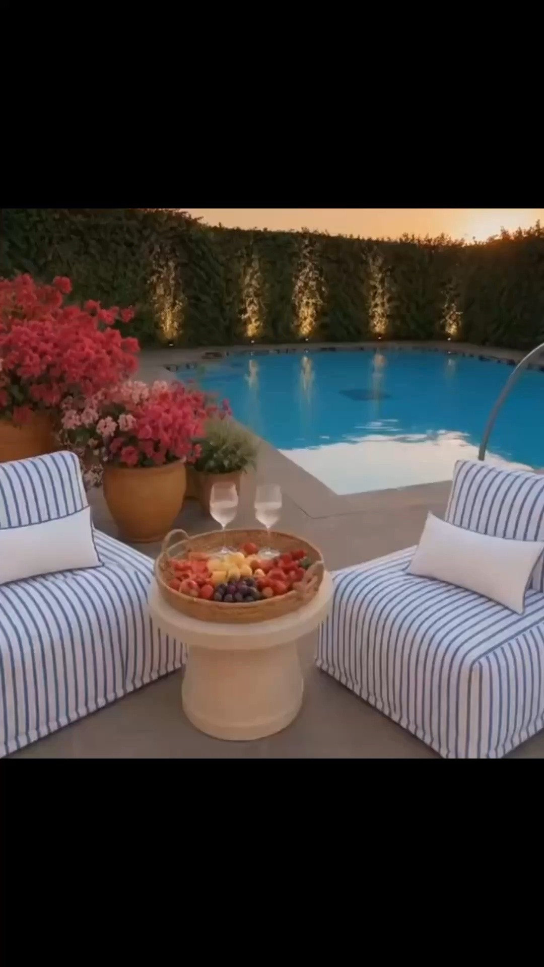 Late afternoon by the pool, when the light softens and the whole space feels quieter.

Low-profile striped lounge chairs, fluted glasses catching the light, rattan details, and that effortless resort feeling that makes home feel like a getaway.

Memorial Day is made for slow afternoons like this.

#memorialday #poolside #outdoorlounge #loungechair #outdoortable #planter #flutedglass #rattantray #rattan #resortstyle #poolsidevibes #outdoorliving #patioinspo

#LTKHome #LTKdayinmylife #LTKHome #LTKSaleAlert