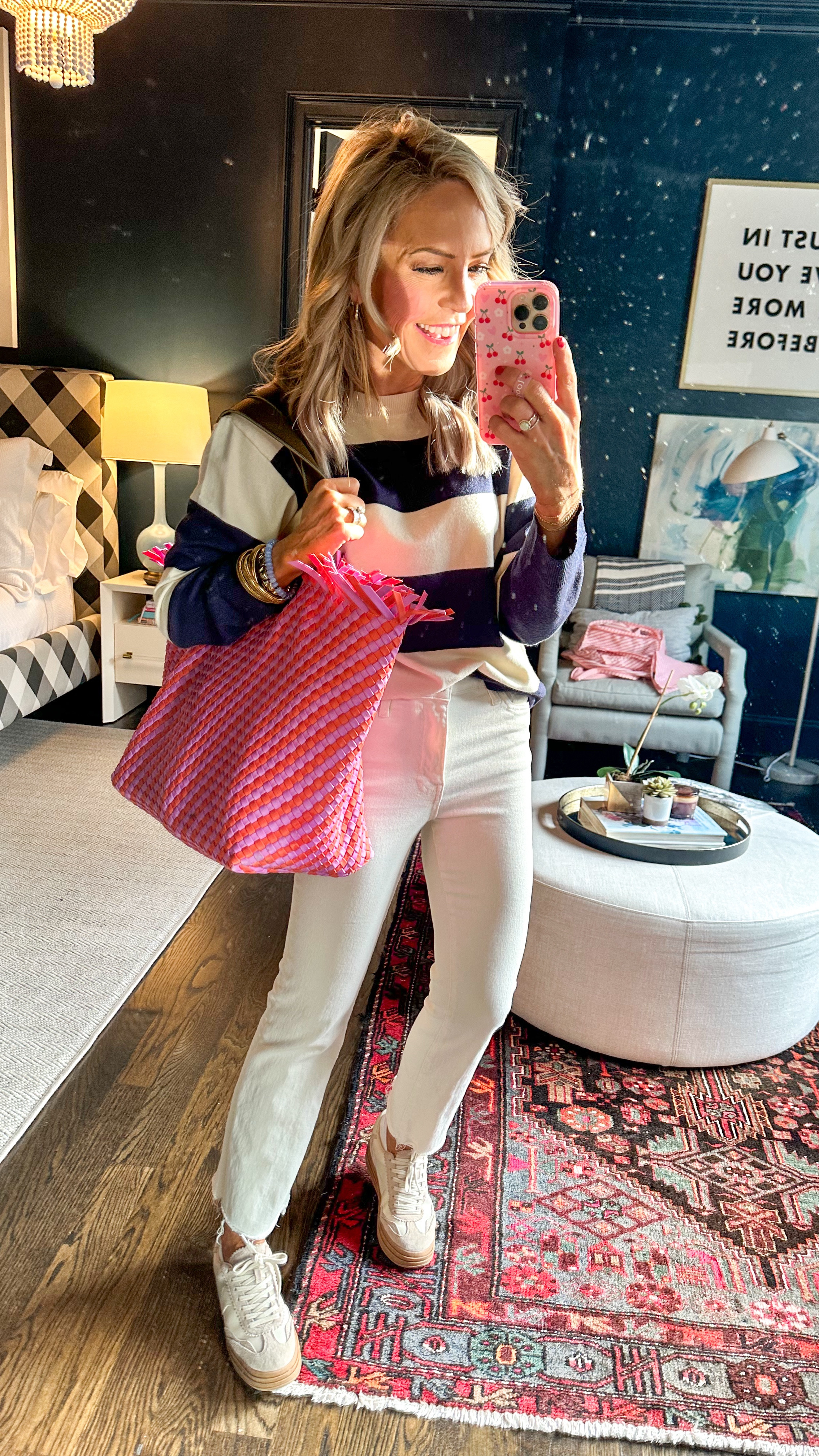 stripes and comfy jeans for a day of travel! wearing XS in sweater and size 24 in jeans and 15% off with Natasha15 || 

#LTKStyleTip #LTKOver40 #LTKFindsUnder100