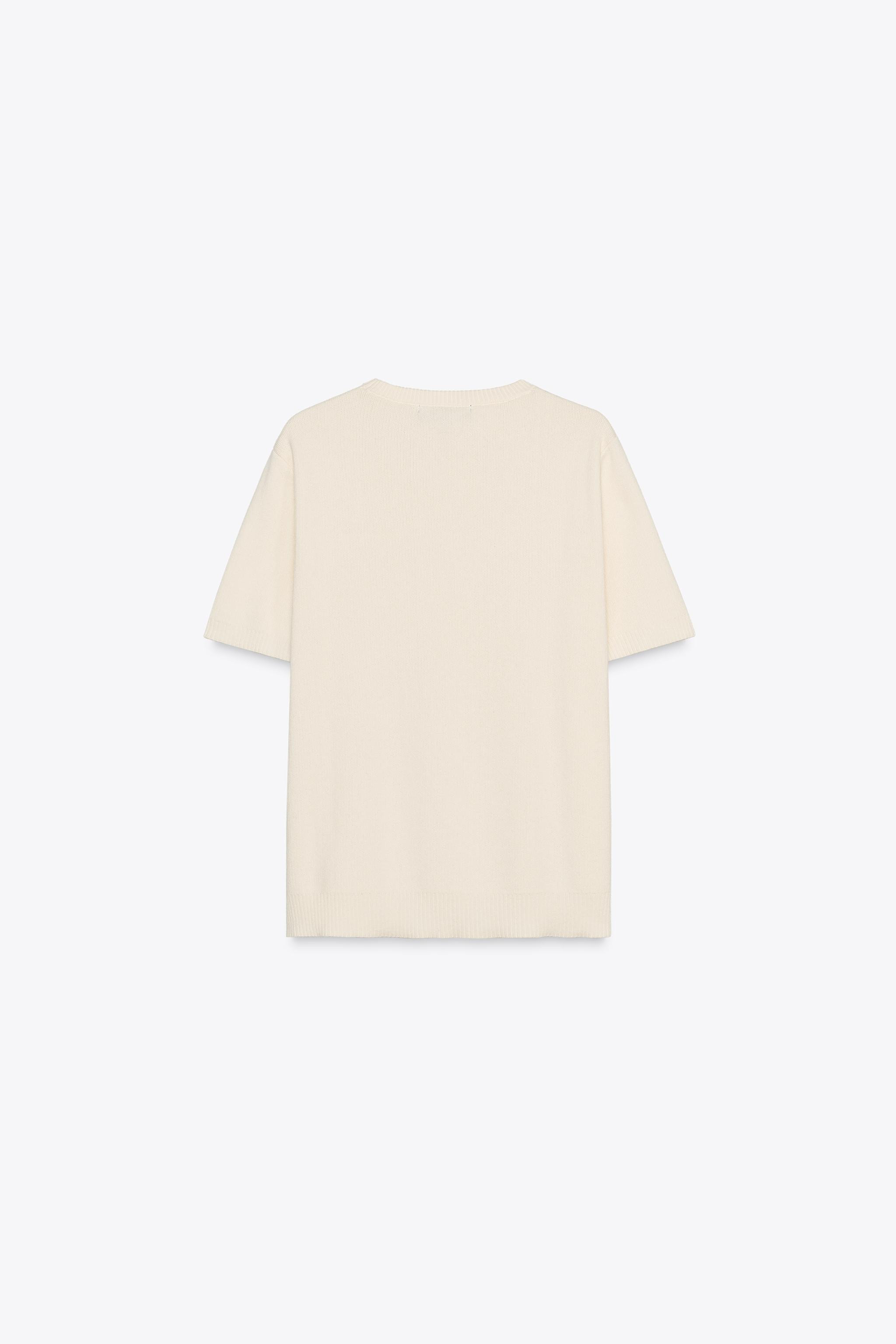 Round neck top with short sleeves. Rib trim. | Zara US