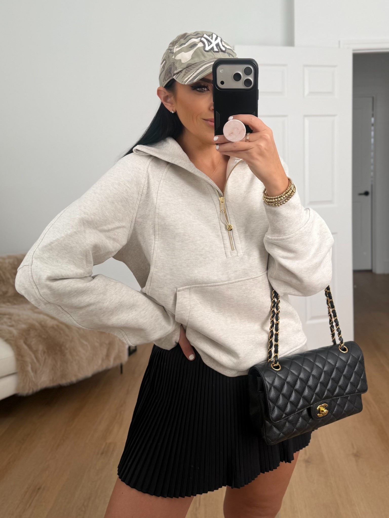 Scuba Oversized Funnel-Neck Half Zip Long wearing size XS/S. Varsity High-Rise Pleated Tennis Skirt wearing size 6