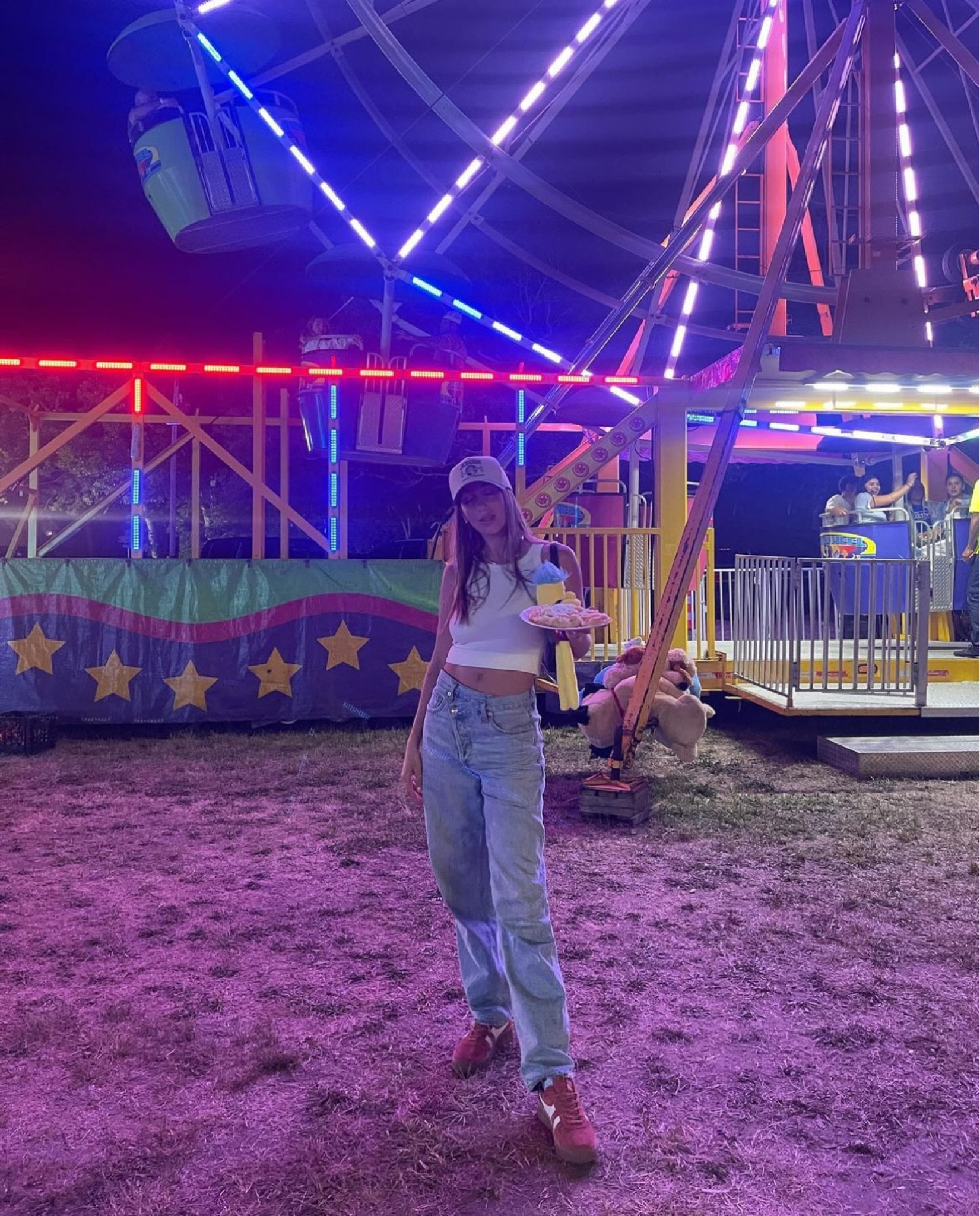 Amanda Batula’s crossover jeans and cropped white tank.   What did you think of this outfit that she wore to the carnival in the season premiere of Summer House?

Personally, I loved it.  

#LTKfindsunder50 #LTKstyletip #LTKSeasonal