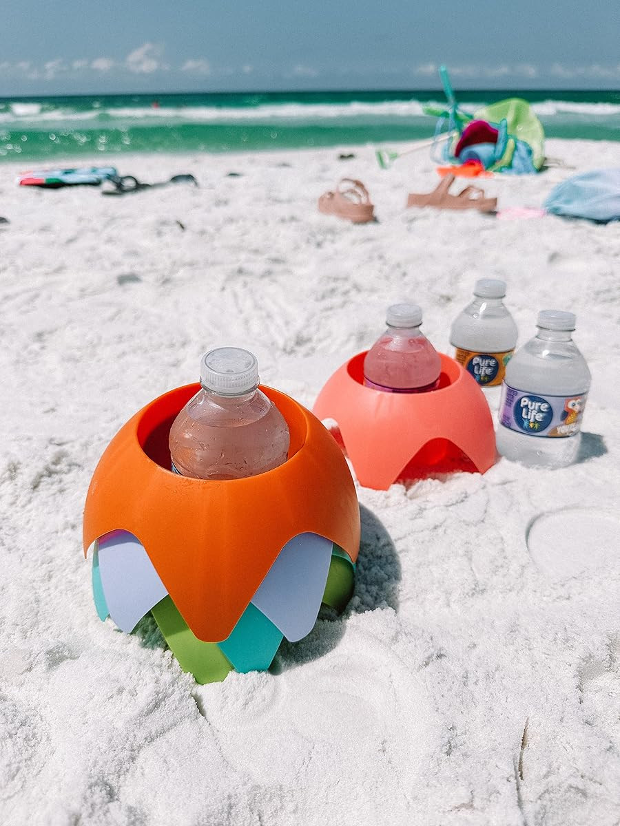 The cutest little beach hack ☀️ These sand coasters keep your drinks (or snacks or sunnies!) up and out of the sand—no more gritty sips, promise! They’re a must-pack for every beach day this summer 🏖️ Linked the exact set we love!

#beachdayessentials #summermusthaves #ltkunder50 #ltkseasonal #amazonfavorites 

 #LTKSeasonal #LTKU #LTKSaleAlert