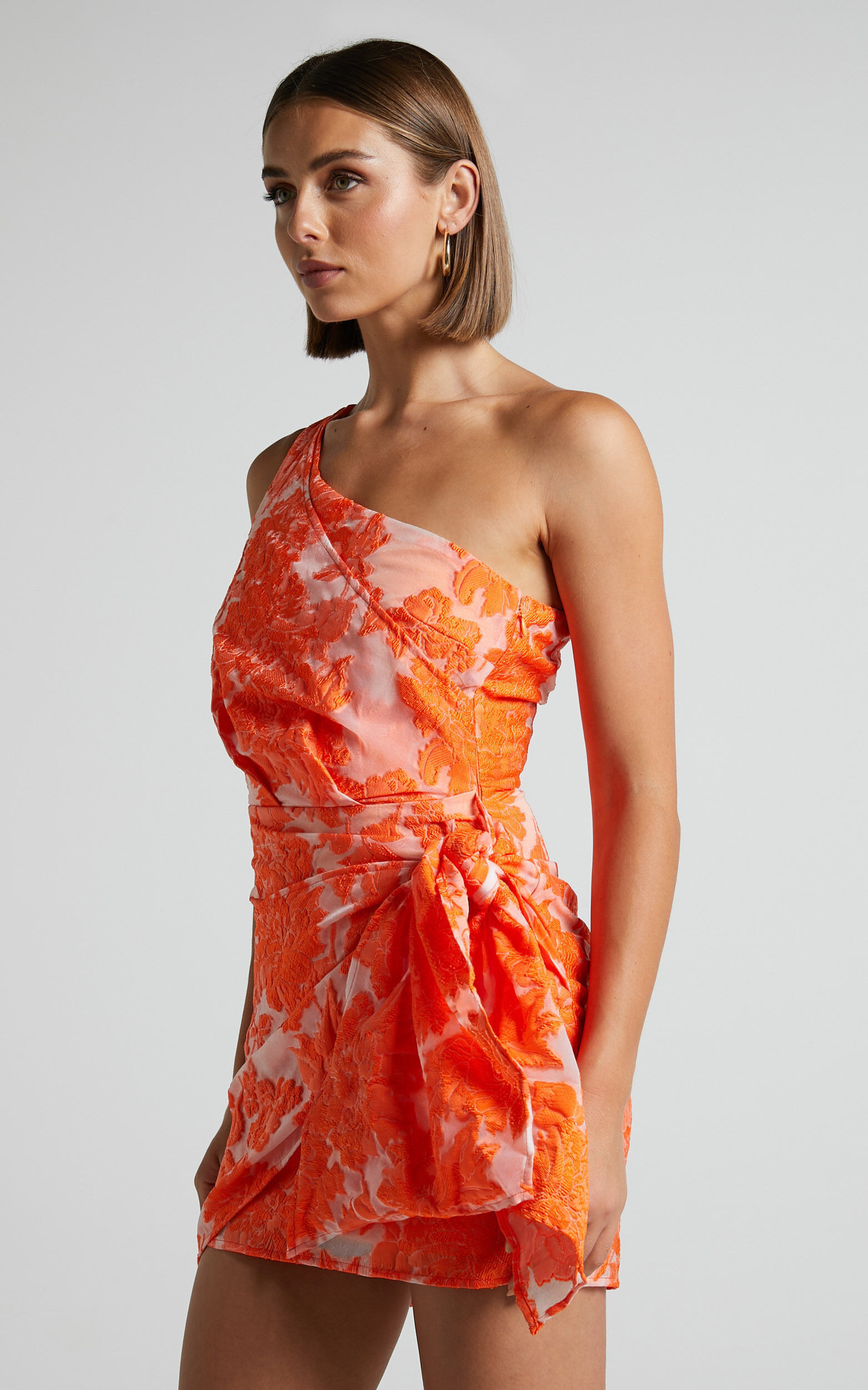 Brailey One Shoulder Wrap Front Mini Dress in Orange Jacquard | Showpo (US, UK & Europe)