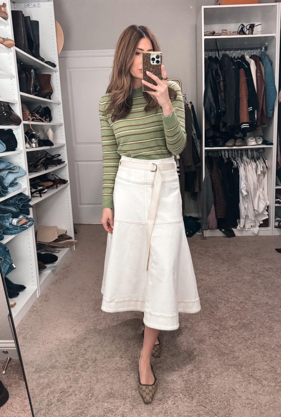 Small in sweater, 0 in skirt 