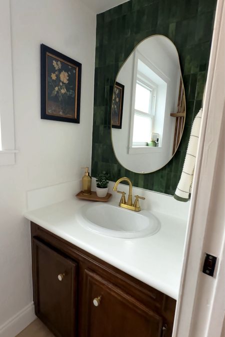 Elevate your bathroom design game: asymmetrical mirrors and modern green tones, perfect for a luxurious upgrade 
#bathroomremodel #moderndesign #moody

#LTKfamily #LTKhome
