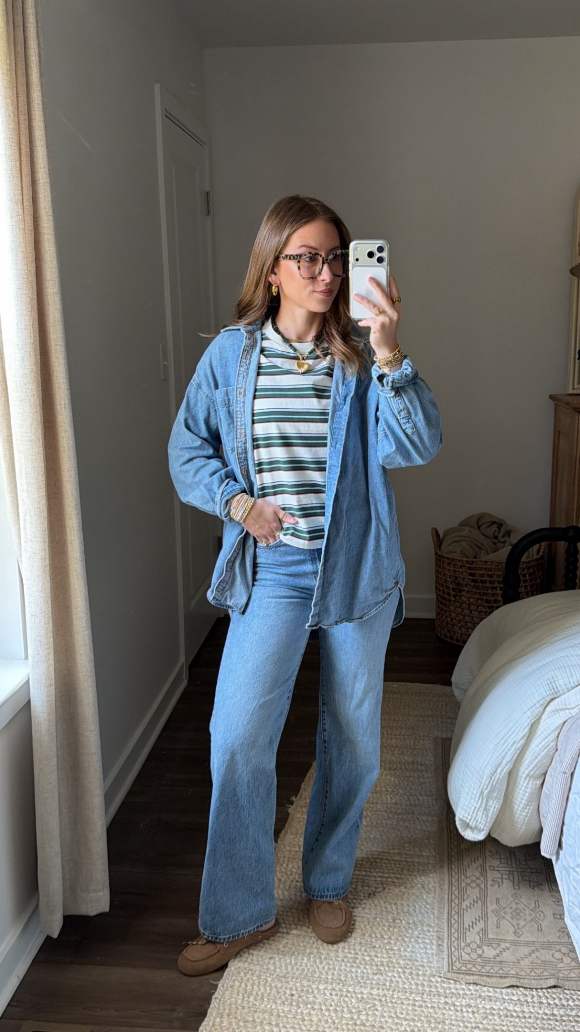 4/9/26 Denim on Denim Spring Outfit

My go-to denim on denim lately 🤍

Wearing my favorite wide-leg jeans paired with an oversized white denim shirt for an easy, elevated look. Layered with a simple striped tee underneath — one of those outfits that feels effortless but still put together.

Finished with my everyday boat shoe slides and a few simple accessories I’ve been wearing on repeat.

Everything I can link is here ✨

#LTKootd #LTKSeasonal