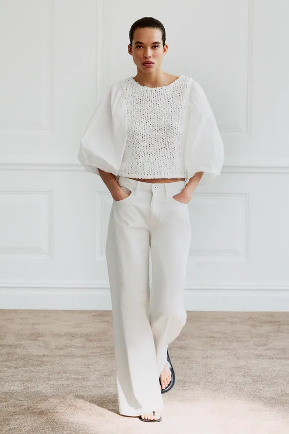 Blouse made from 58% cotton with a round neck and elbow-length balloon sleeves, adjustable with a... | Zara UK