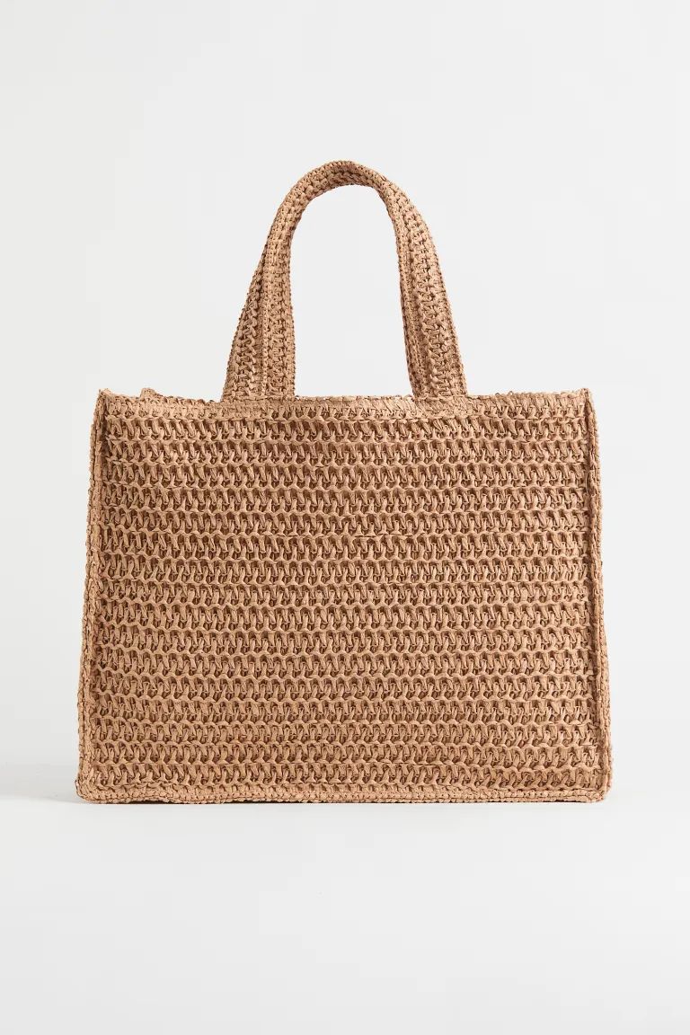 Crochet-look shopper in braided paper straw. Long handles for easy wear over shoulder or as a han... | H&M (US + CA)