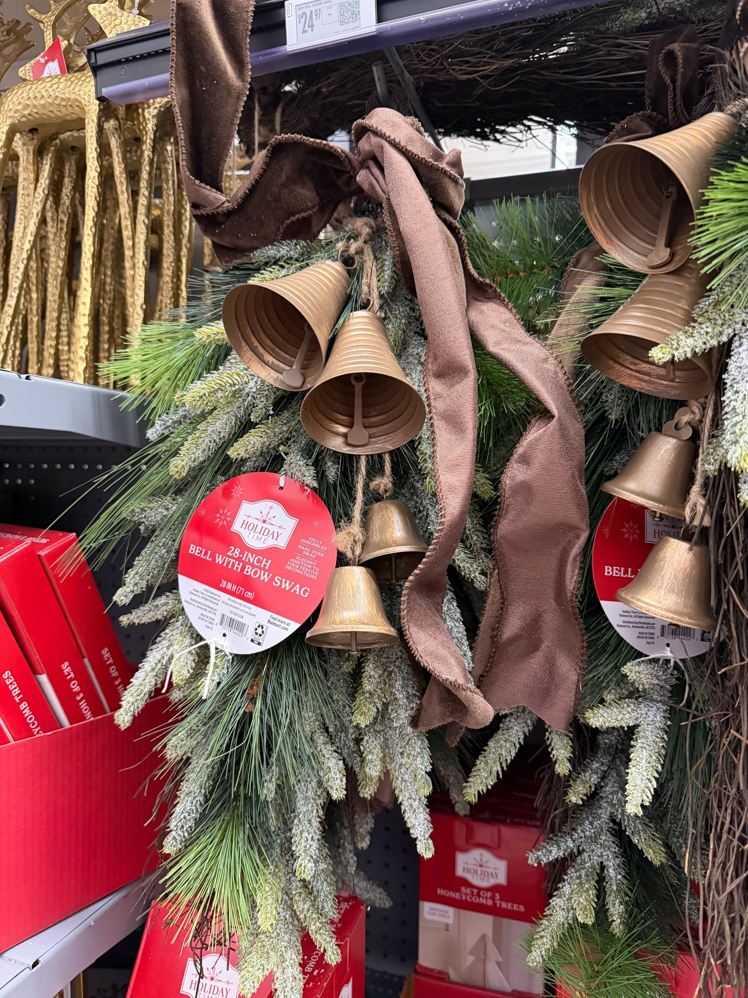 Beautiful winter swag. Brown ribbon and brass bells 

#LTKHome #LTKHoliday #LTKSaleAlert
