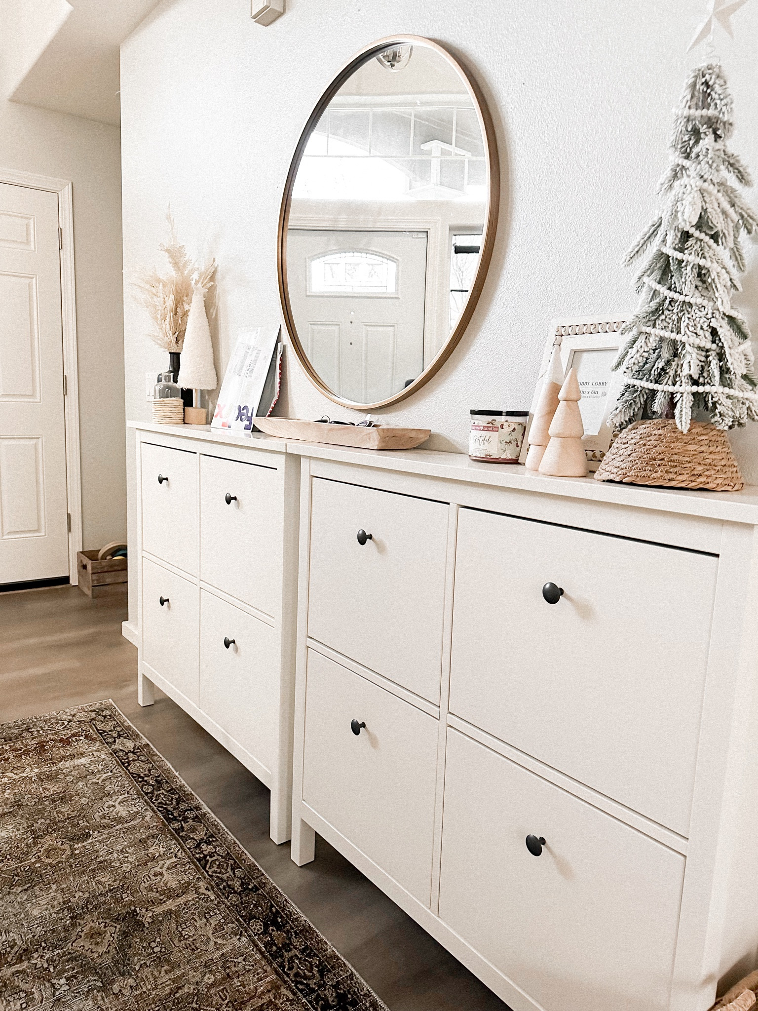 Entry way decor
Cabinets are ikea shoe cabinets 
Entry way rug 

#LTKhome #LTKunder50 #LTKSeasonal