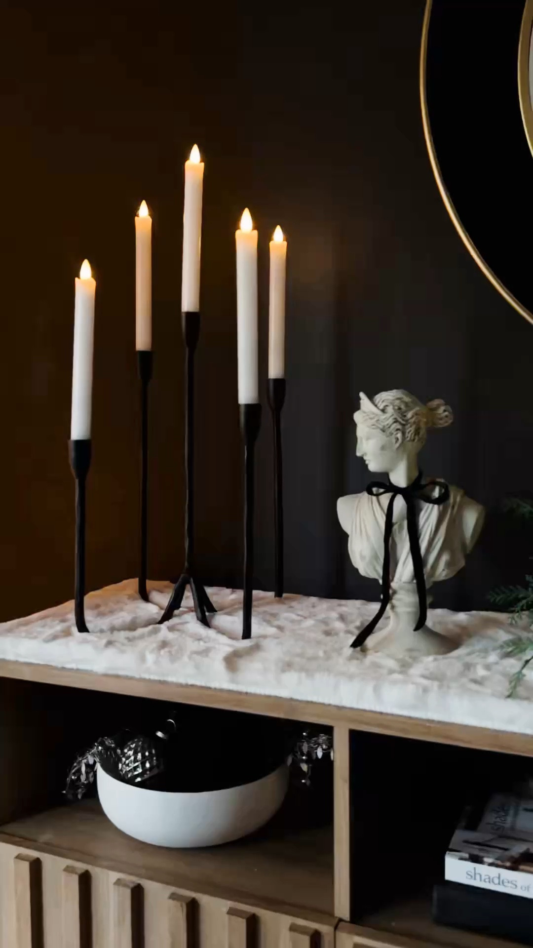 Cozy meets chic ✨ A sideboard styled for the season, complete with glowing candles, moody accents, and hints of holiday sparkle. Perfectly paired with a flocked tree dressed in scarlet red bows for a timeless holiday look!

#LTKWatchNow #LTKHoliday #LTKSeasonal