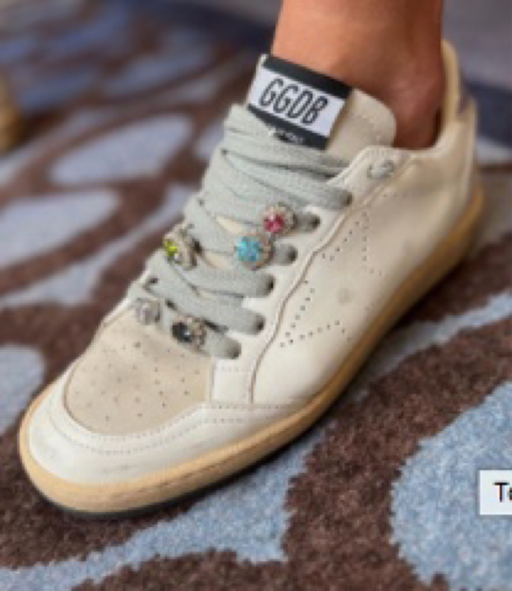 Lots of questions about Crystal’s shoelace charms today.  We’ve linked her sneakers that came with the charms as well as some other options if you want to add a little
bling to a pair you already own! 

#LTKFind #LTKstyletip #LTKshoecrush