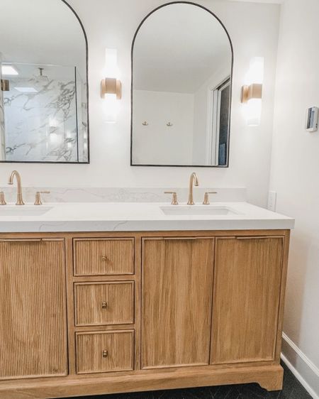 This bathroom renovation has been done for a while now and I still find myself admiring it. This vanity is just beautiful and I love the amount of storage it has 🖤

Interior design, home decor, Wayfair home, wayfair clearance, Labor Day, affordable home finds, home deals, great value, budget friendly, great savings, interiors, mirror, lighting, console, entryway, hallway decor, bathroom vanities, living areas, den decor, sofas, dining room, art, living room, bedroom, bathroom renovation, guest bathroom, vanity, bathroom lights 



#LTKHome #LTKFamily #LTKSaleAlert