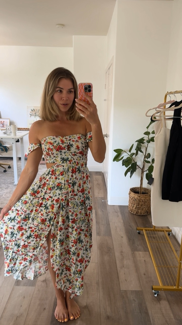 Wearing a small, will size up but tts. 
Cute cutouts on the side and little button details on front. 