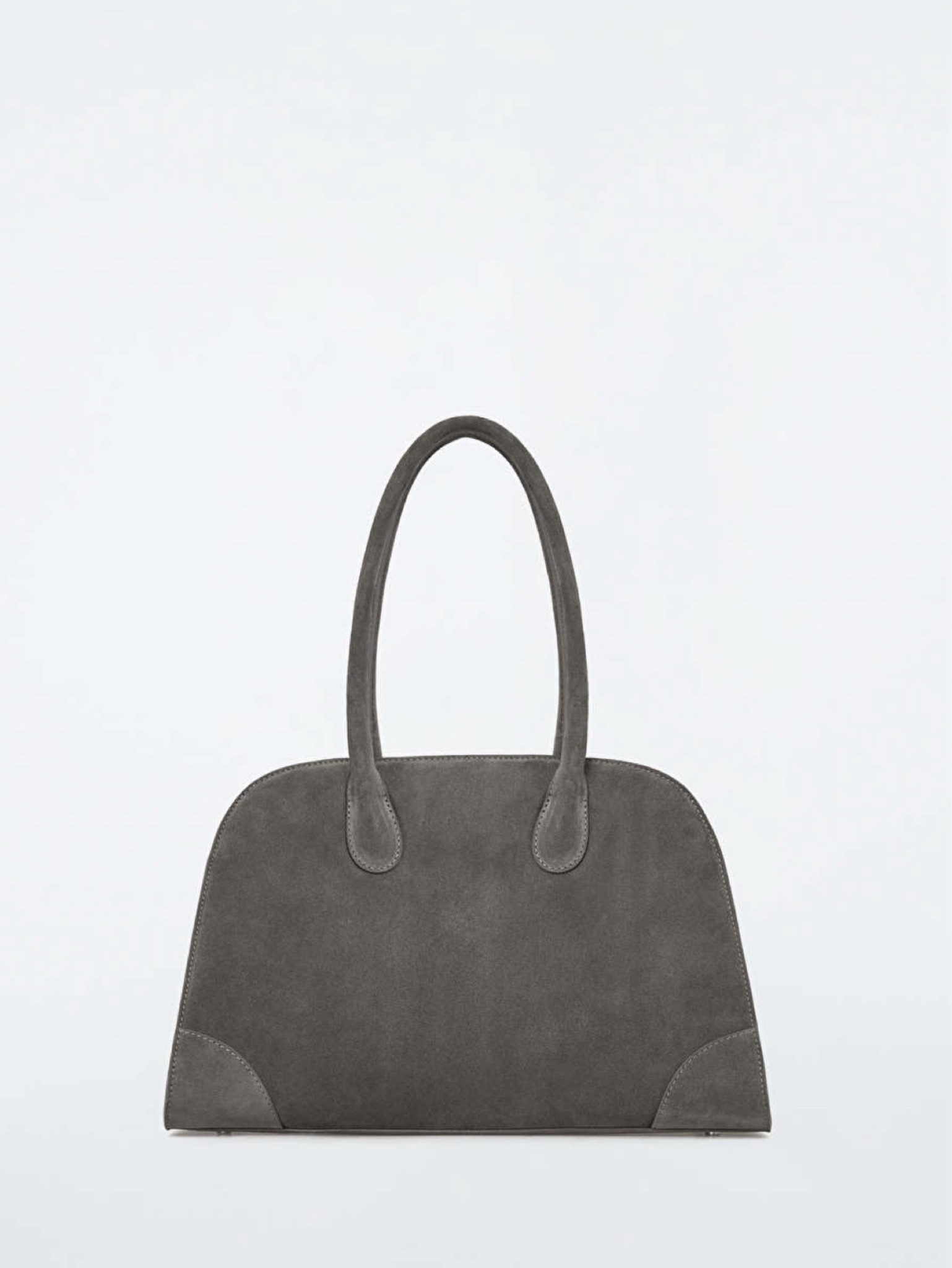 The iconic cos bag is back in a new size and colour 🩶 guaranteed to be another sell out. 

Grey suede bag, suede bag, the row Margaux, suede, handbag, bowling bag

#FashionMonth #LTKautumn #LTKbag