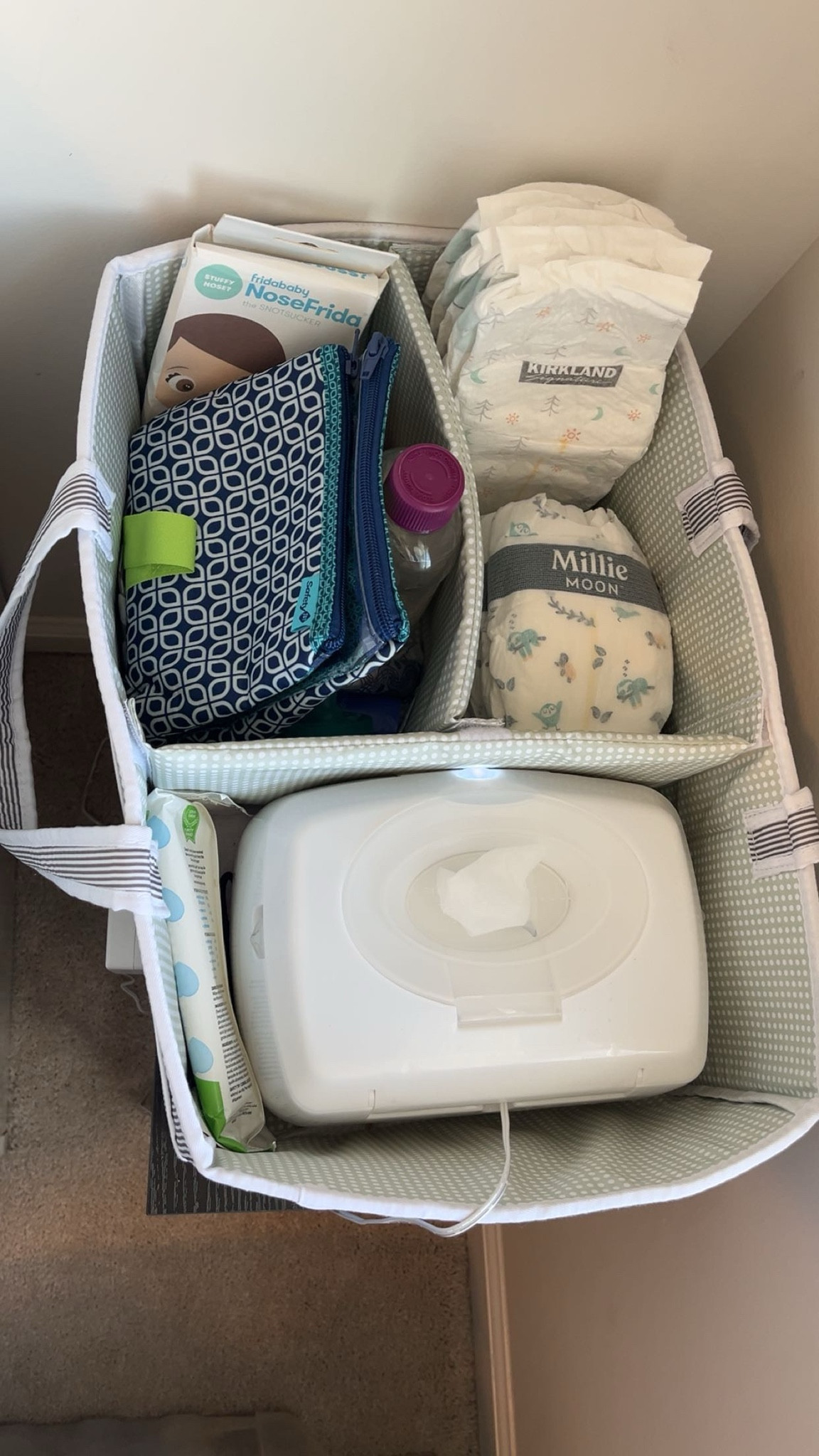Our nursery diaper caddy holds extra safety and hygiene tools in addition to toddler diapers, wipes, and booster pads. The wipe warmer is great for keeping little ones comfortable and avoiding mid-change mishaps!

#NurseryNeeds

#LTKmomlife #LTKBaby