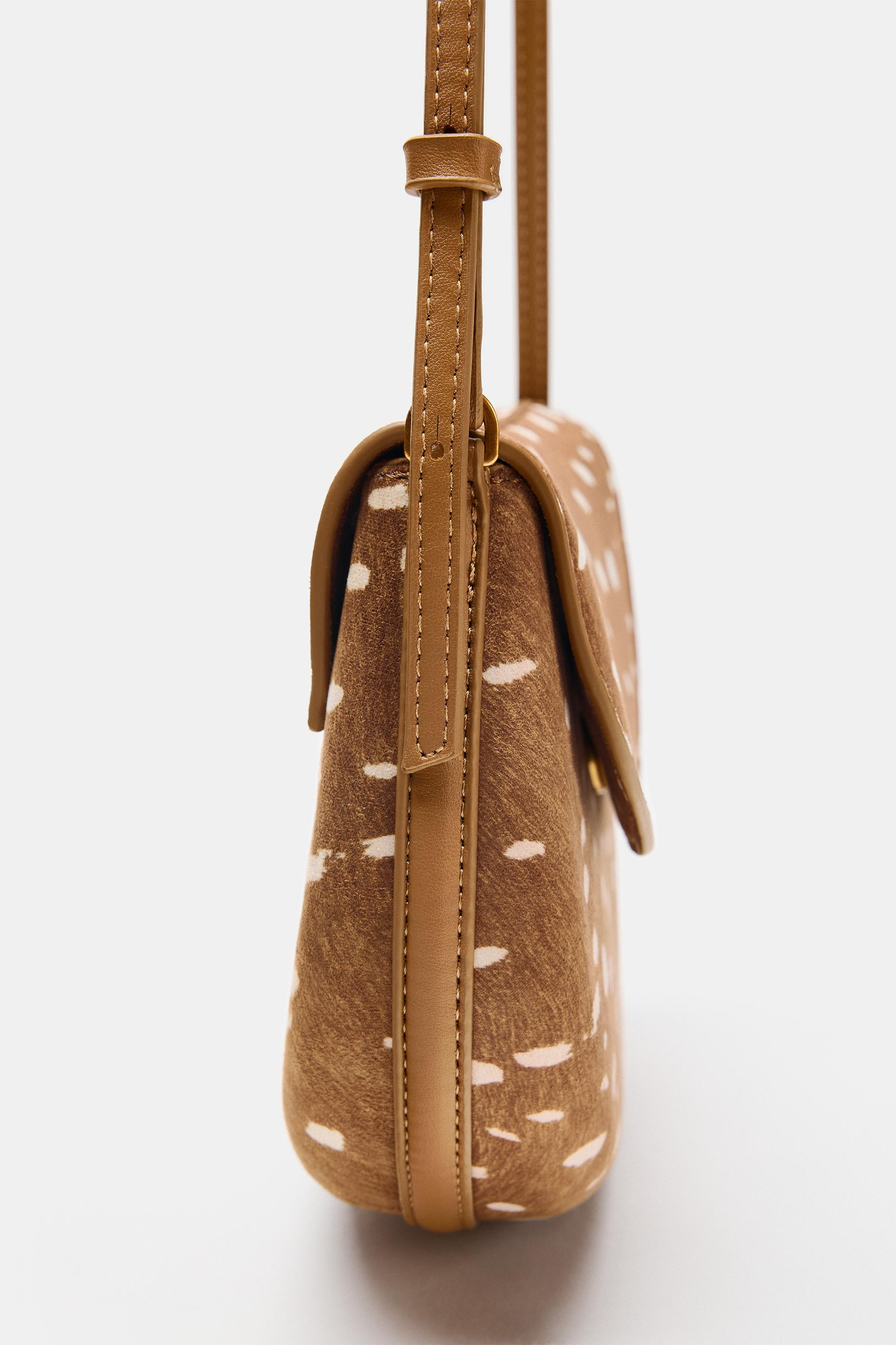 Crossbody bag. Animal print body. Interior zip pocket. Contrasting topstitching. Crossbody strap.... | Zara US
