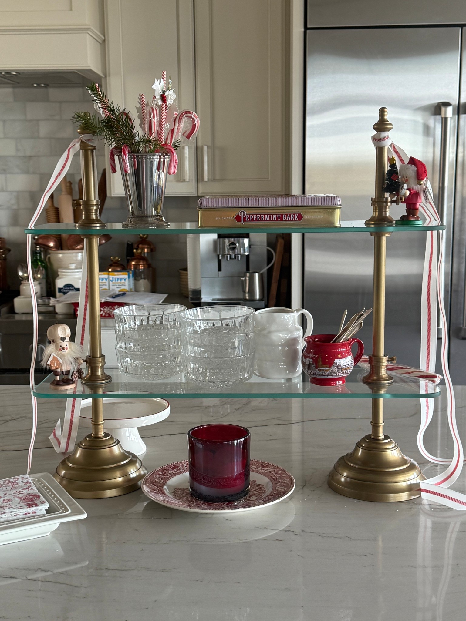 A patisserie-inspired serving stand that feels straight out of Europe. Crafted from weighted plated brass with adjustable tempered glass shelves—beautiful and functional.

#LTKWedding #LTKHome #LTKfoodie
