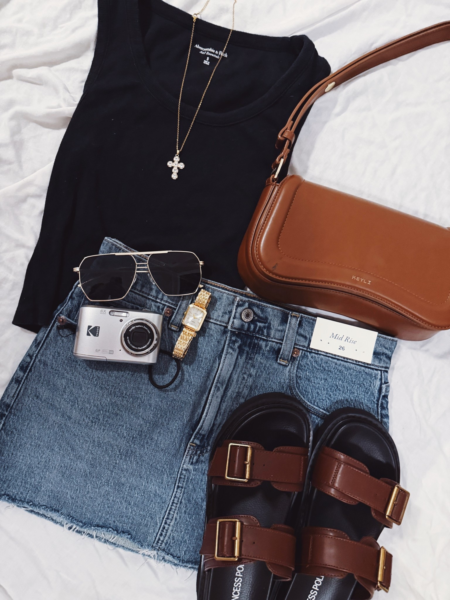 outfit inspo 🤩🌟 love this new skort from abercrombie. ( it actually look like a skirt in the back too unlike other denim skorts i see!!!) 

#LTKFindsUnder100 #LTKU #LTKSeasonal