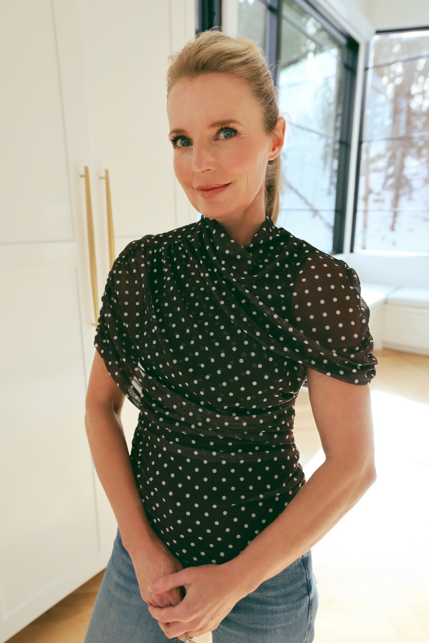 If you’re ever unsure whether a print feels modern or dated, go small.

Delicate polka dots, thin vertical stripes, and elegant florals in softer, natural color palettes tend to feel timeless and sophisticated.

Smaller-scale prints are also more flattering—they don’t overwhelm your frame or add visual bulk. Instead, they enhance your look with subtle interest and polish.

This polka dot blouse print feels refined, not loud. The cape-style silhouette and wrap-front detail add beautiful shape, while the high neckline and lightweight mesh fabric make it incredibly versatile. Pair it with jeans for a casual day out, or dress it up with trousers for an elevated evening look. TTS. 

#LTKSeasonal #LTKOver40