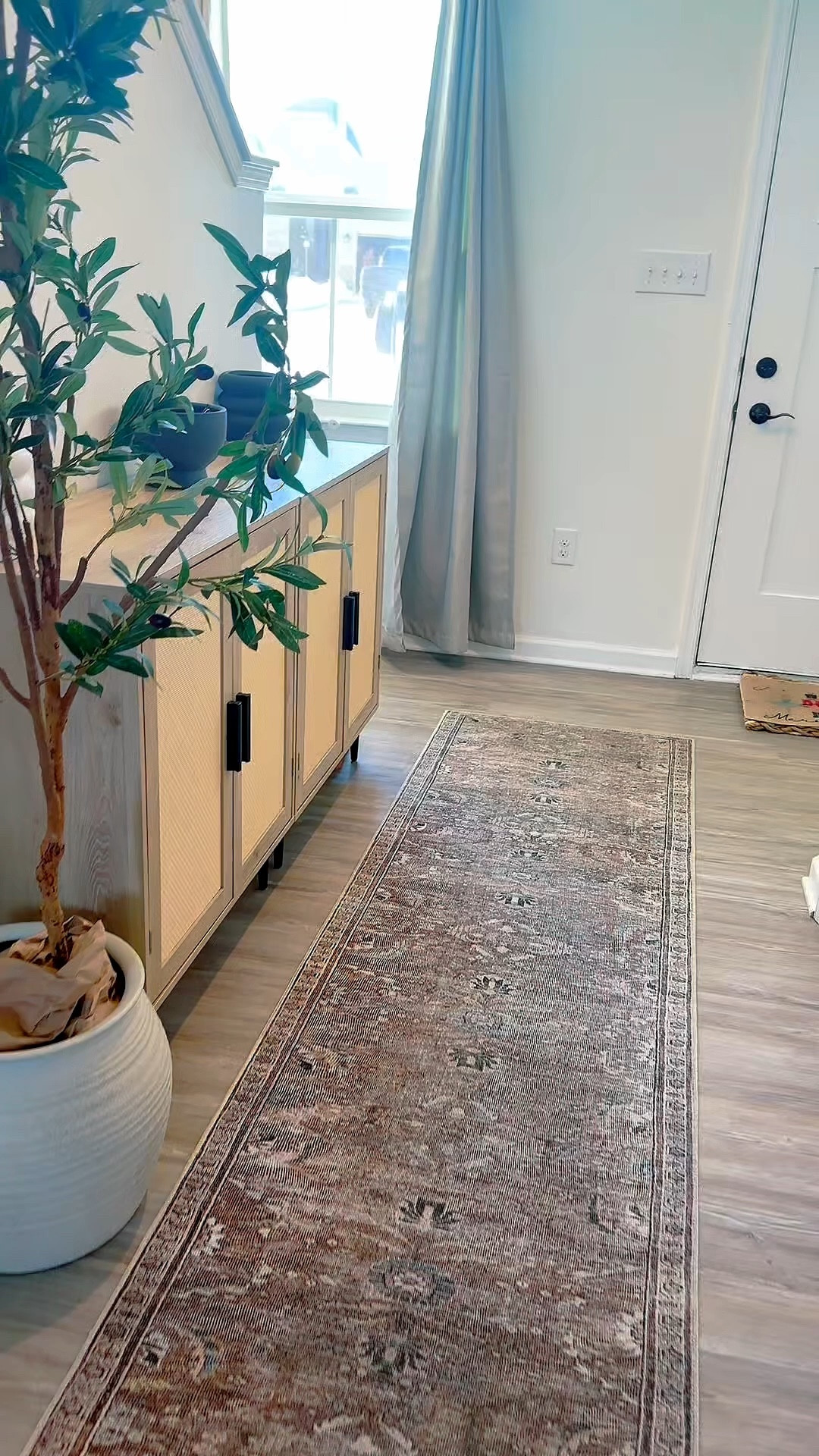 Entryway refresh 🤍
Added this rug runner and cabinet for a little extra warmth and storage when you walk in. Loving how it pulled the whole space together.


#LTKHome #LTKmomlife